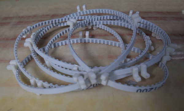 同步带加异形挡块